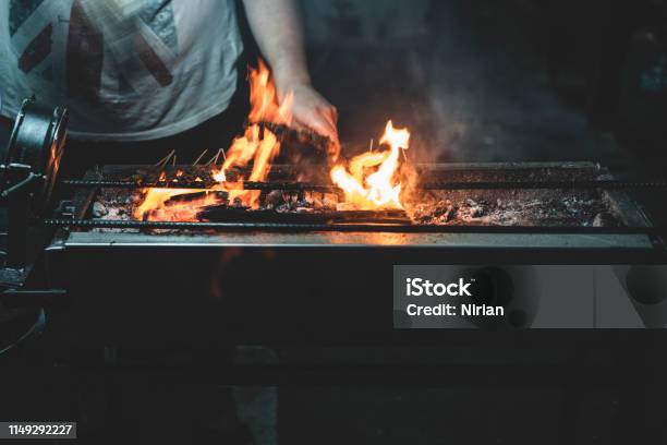 Fire On The Barbecue Stock Photo - Download Image Now - Barbecue Grill, Barbecue - Meal, Chef