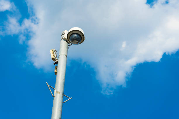 istock CCTV system against the blue sky, installed on a city street pole. 1149292265