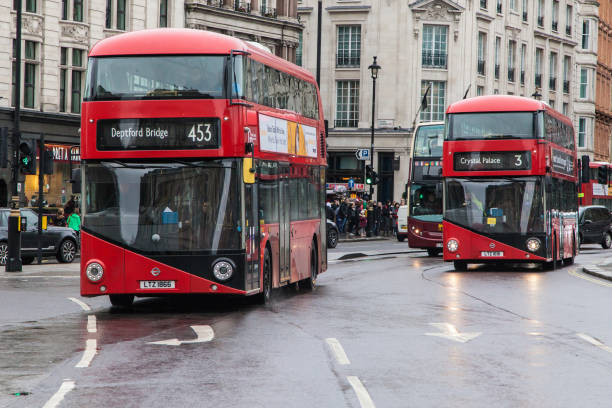 Two New Routemasters at Trafalgar Square London, United Kingdom - December 23, 2019: Two Wrightbus New Routemaster travelling around Trafalgar Square, London, United Kingdom. boris bus stock pictures, royalty-free photos & images