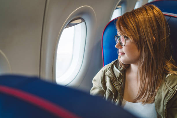 istock Looking out of the plane window 1149293491