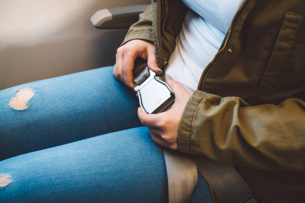 istock Fastening a seat belt on board 1149295931