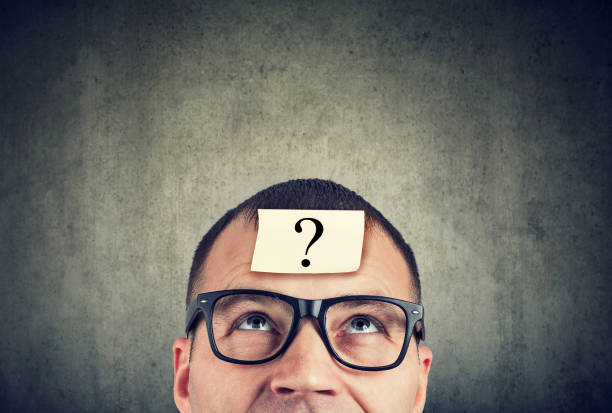 istock man in glasses with question mark looking up 1149296687
