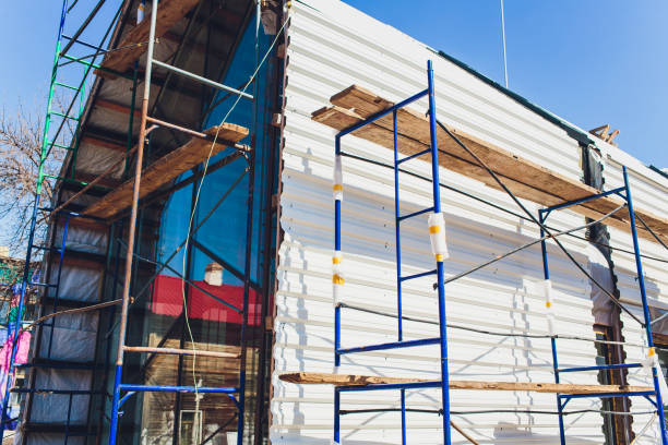 istock Scaffold between floors and interior partitions in construction building aerial view. Employees working on construction site of high rise building. 1149297822