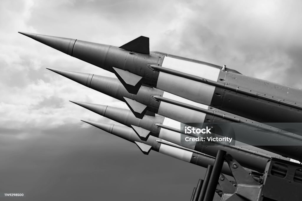 Balistic Rockets War Background. Nuclear Missiles With Warhead Aimed at Gloomy Sky. Missile Stock Photo
