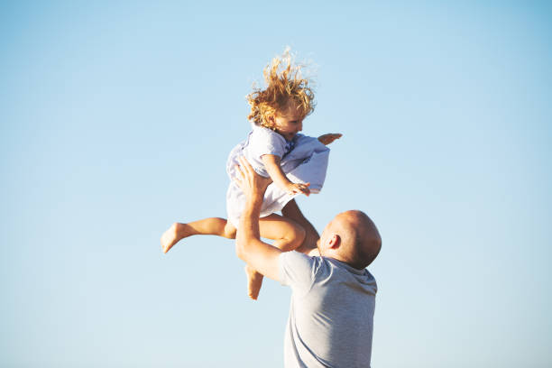 istock Family at the beach 1149299239