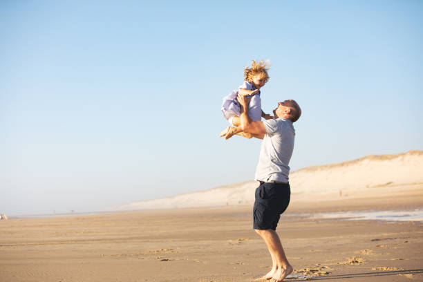 istock Family at the beach 1149299247