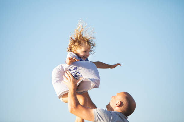 istock Family at the beach 1149299283