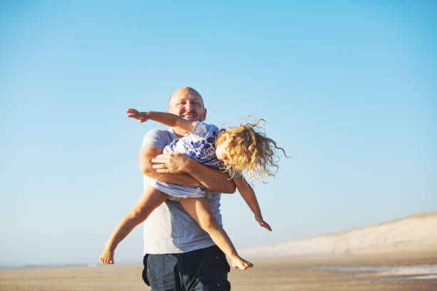 istock Family at the beach 1149299299