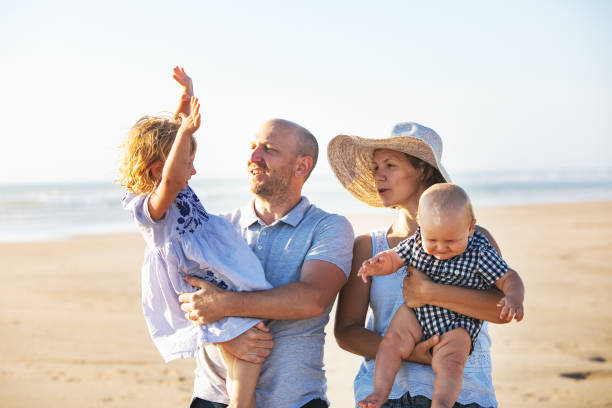 istock Family at the beach 1149299419