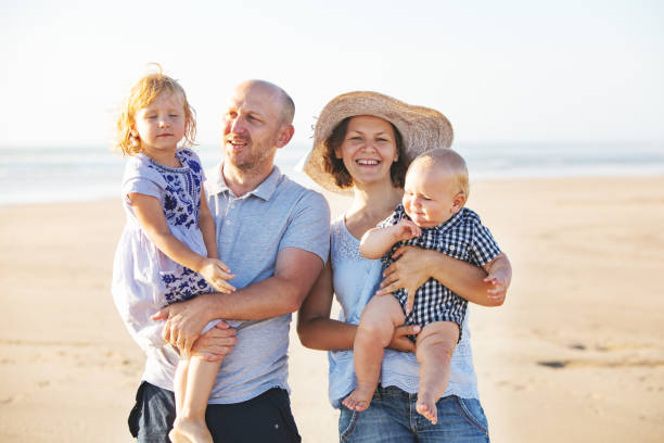 istock Family at the beach 1149299425