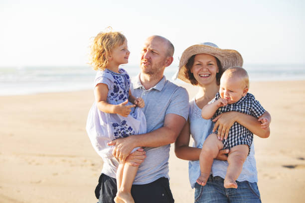 istock Family at the beach 1149299446