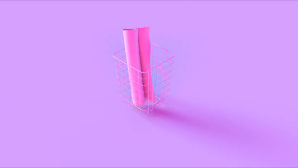 istock Pink Rolled Up Paper in a Wire Basket 1149300944