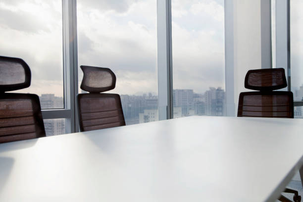 istock Meeting room with cityscape sun and clouds 1149305261