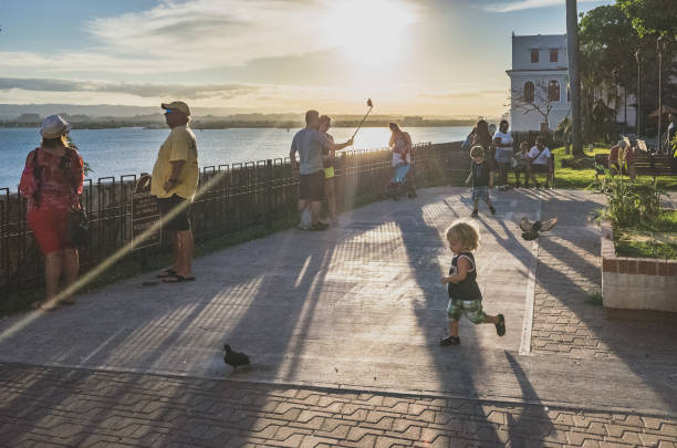 Locals enjoying a sunset view in San Juan stock photo
