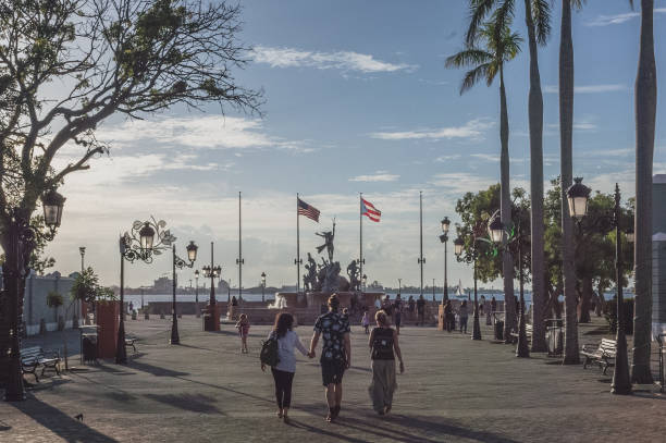 People walking on promenade in San Juan stock photo