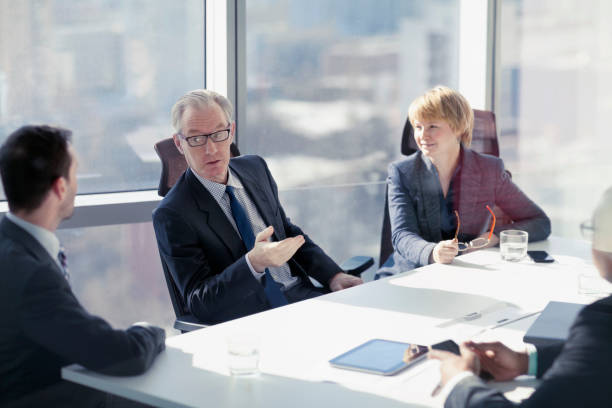 Businessman asking for ideas in conference room meeting