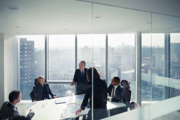 Business colleagues talking in meeting room