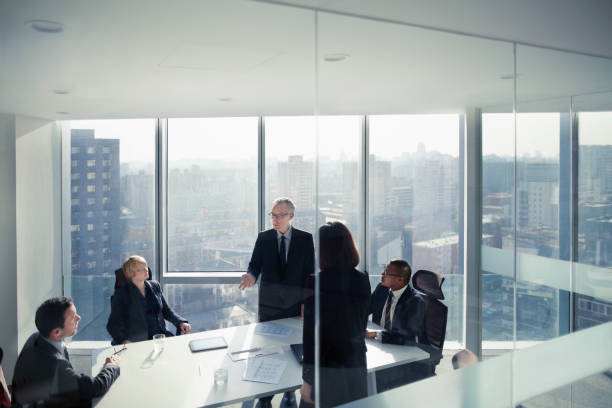 istock Business colleagues talking in meeting room 1149306476