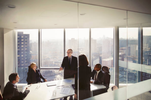 istock Business colleagues talking in meeting room 1149306494