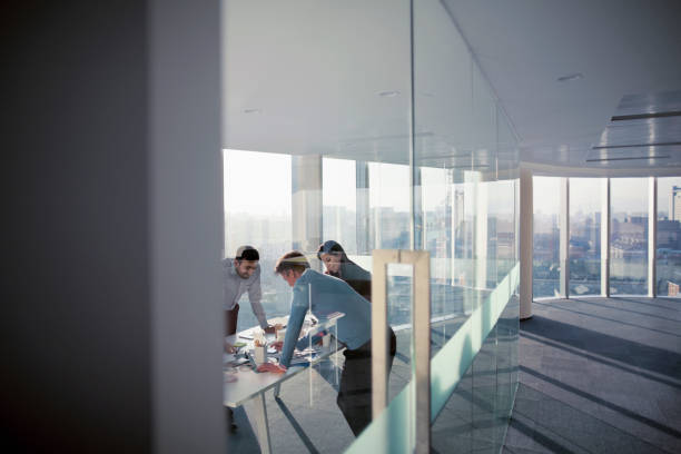 istock Business colleagues talking in planning meeting 1149306613