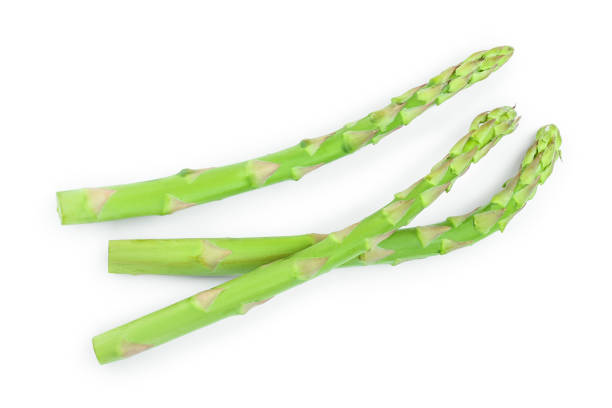 istock Fresh sprouts of asparagus isolated on white background. Top view. Flat lay 1149306780