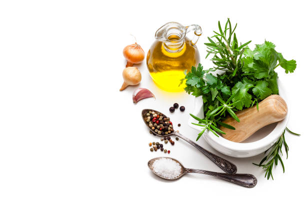 cooking and seasoning ingredients: fresh herbs and spices isolated on white background. - mortar and pestle condiment isolated food imagens e fotografias de stock