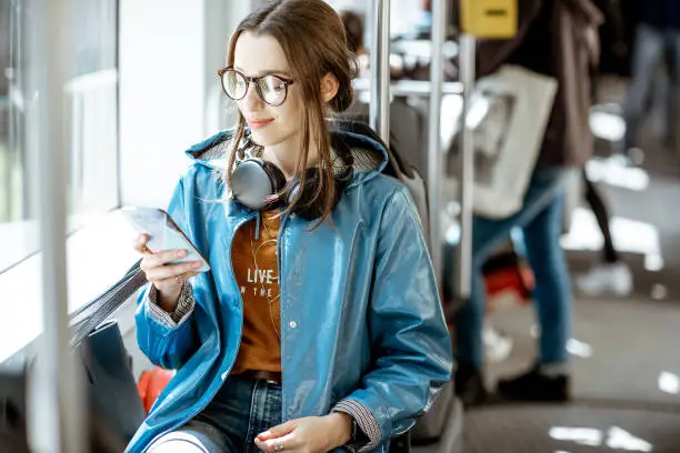 Photo of Female passenger using public transport