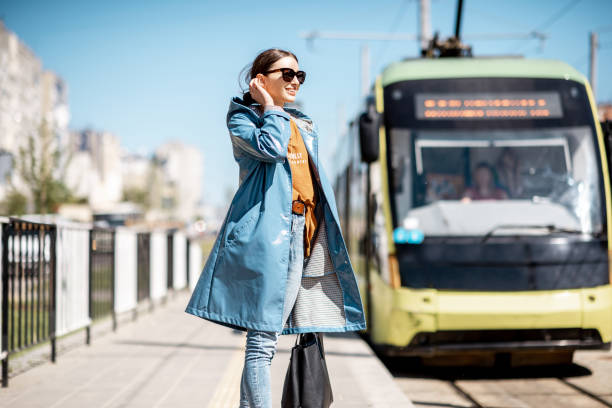 istock Woman waiting for the tram 1149310755