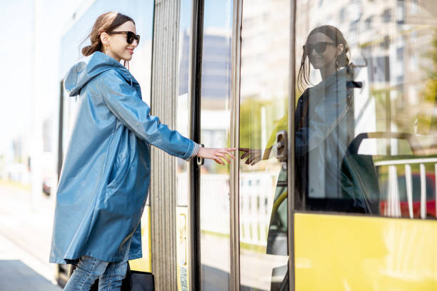 istock Woman entering the public tram 1149310777