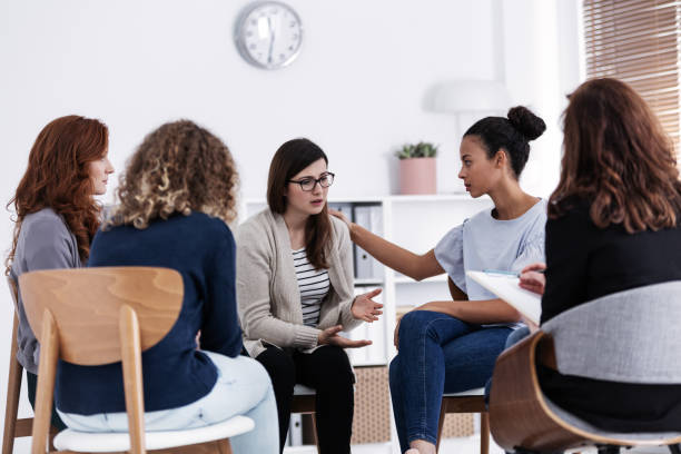 istock First meeting of Women's issues support group meeting, group therapy concept 1149312507