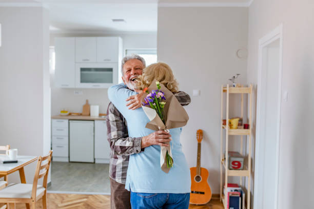 istock Happy elderly couple celebrating wedding anniversary 1149314421