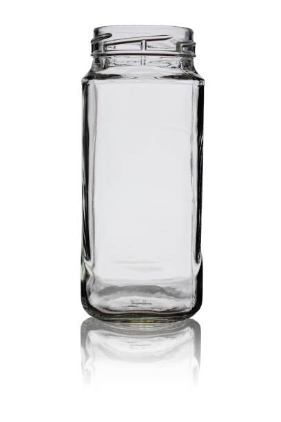 istock Opened empty glass jar for jam isolated on a white background with reflection 1149317260