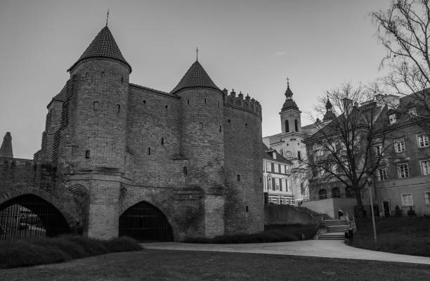 A black and white picture of the Warsaw Barbican.