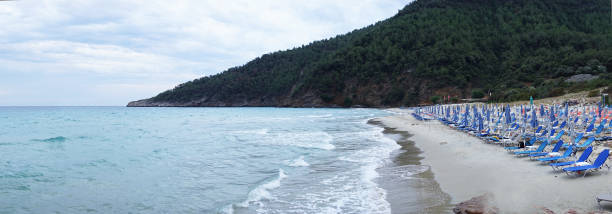 istock Empty Sunbeds in Paradise Beach, Thassos Island 1149318680
