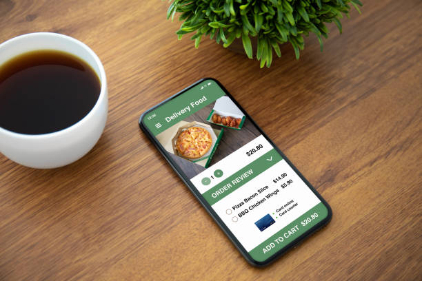 istock touch phone with app delivery food on the screen 1149318930