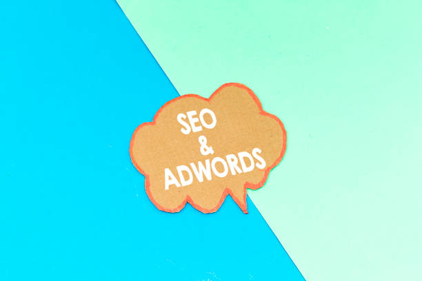 seo and adwords speech bubble isolated on pink and blue background