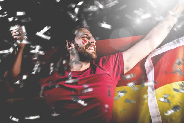 German fan celebrating with the national flag