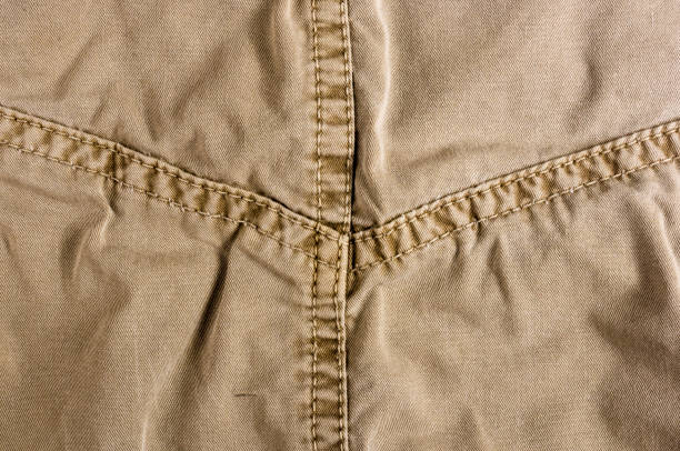 istock clothing items washed cotton fabric texture with seams 1149322219