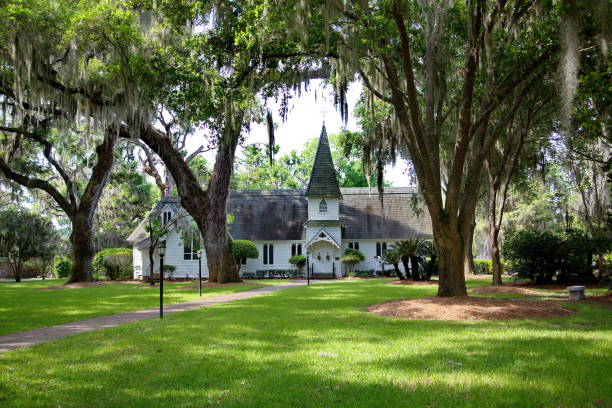 istock White Church Over Green Grass 1149323514