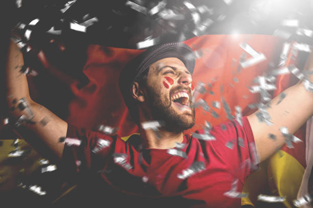 istock German fan celebrating with the national flag 1149323983
