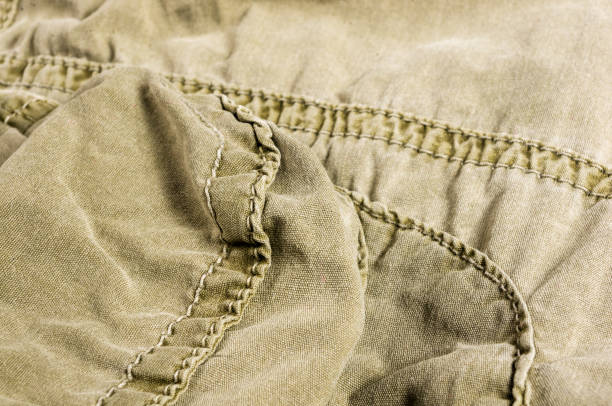 istock clothing items washed cotton fabric texture with seams 1149325150