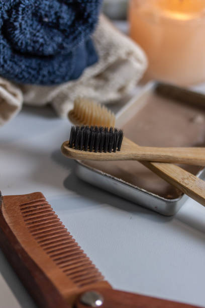 istock Two eco friendly bamboo tooth brushes in a bathroom zero waste cosmetics 1149328099