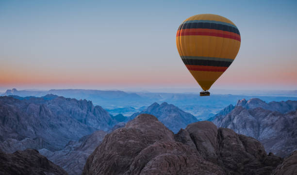 istock Hot air balloon over Mount Moses Sinai sunset 1149329096