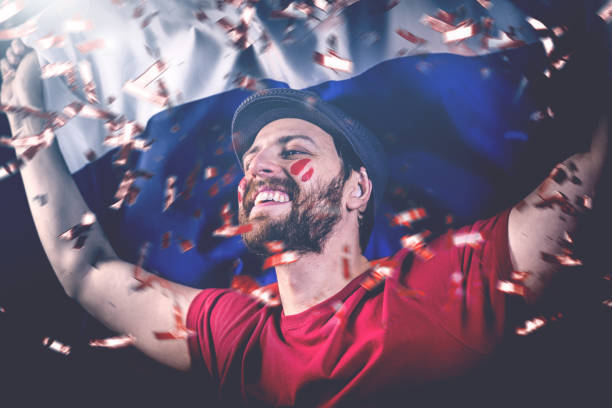 istock Russian fan celebrating with the national flag 1149330985