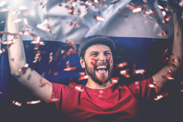 istock Russian fan celebrating with the national flag 1149330997