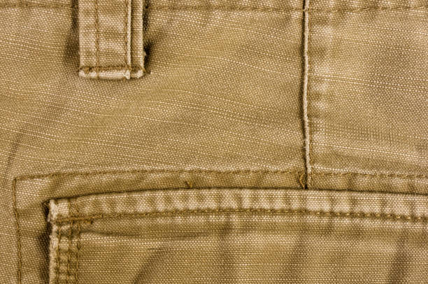 istock clothing items washed cotton fabric texture with seams 1149331774