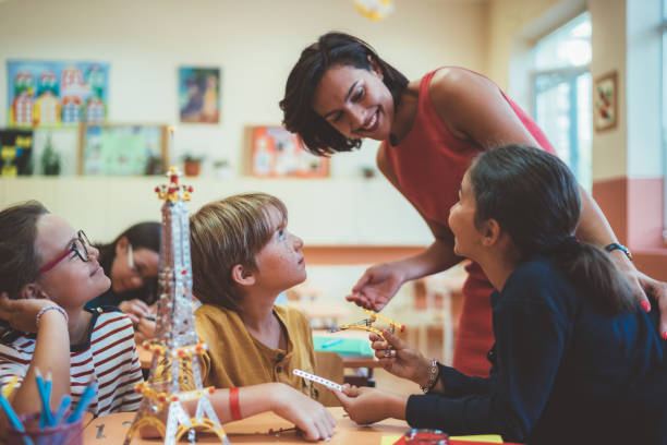 istock School children with teacher in class 1149337253