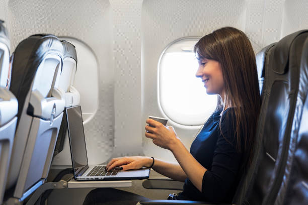 istock Women at airplane 1149339974