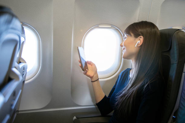 istock Women at airplane 1149340207