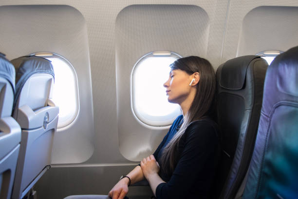 istock Women at airplane 1149340277